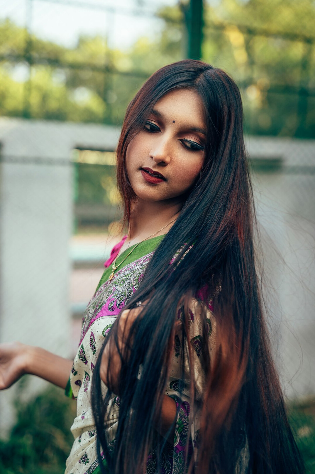 Portrait of a young woman with long hair